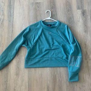 Women’s small Nike blue cropped crewneck.